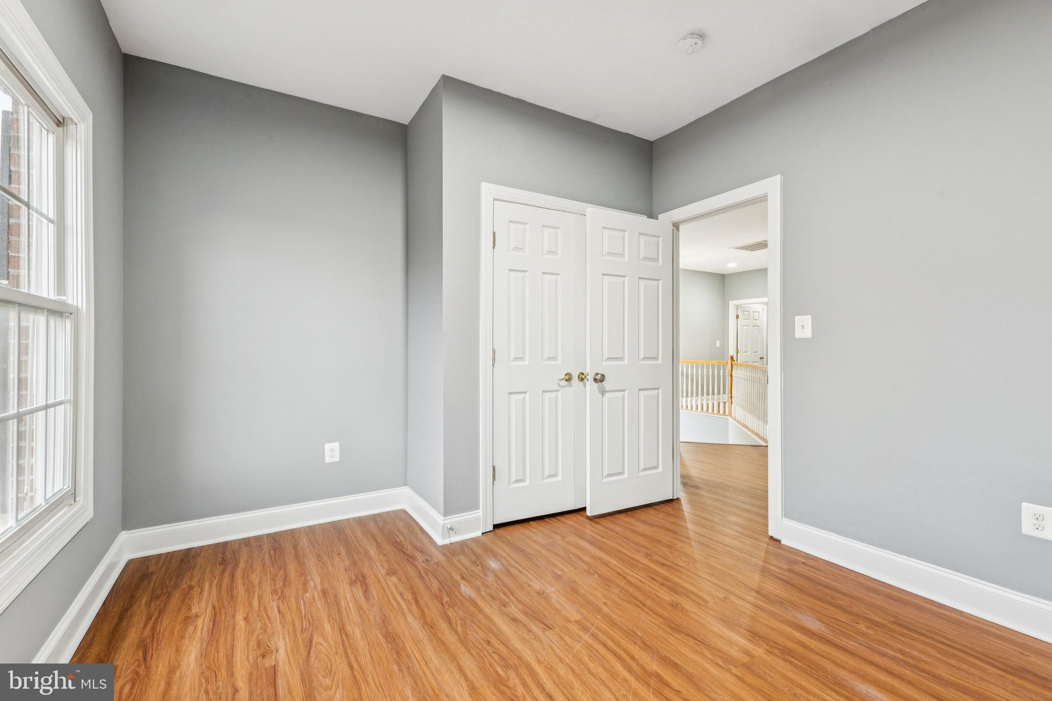 16363 Rusty Rudder Drive Woodbridge, VA 22191 - Photo 28 of 40 a view of empty room with wooden floor and fan