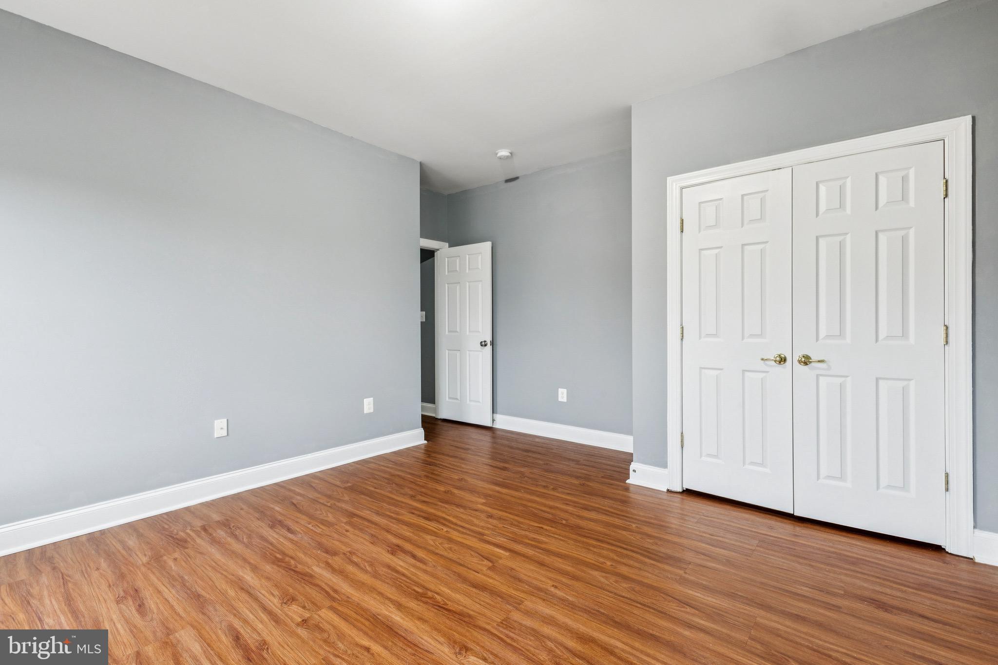 16363 Rusty Rudder Drive Woodbridge, VA 22191 - Photo 30 of 40 a view of an empty room with wooden floor