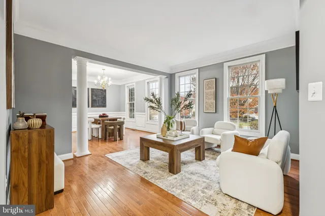 a living room with furniture and a table