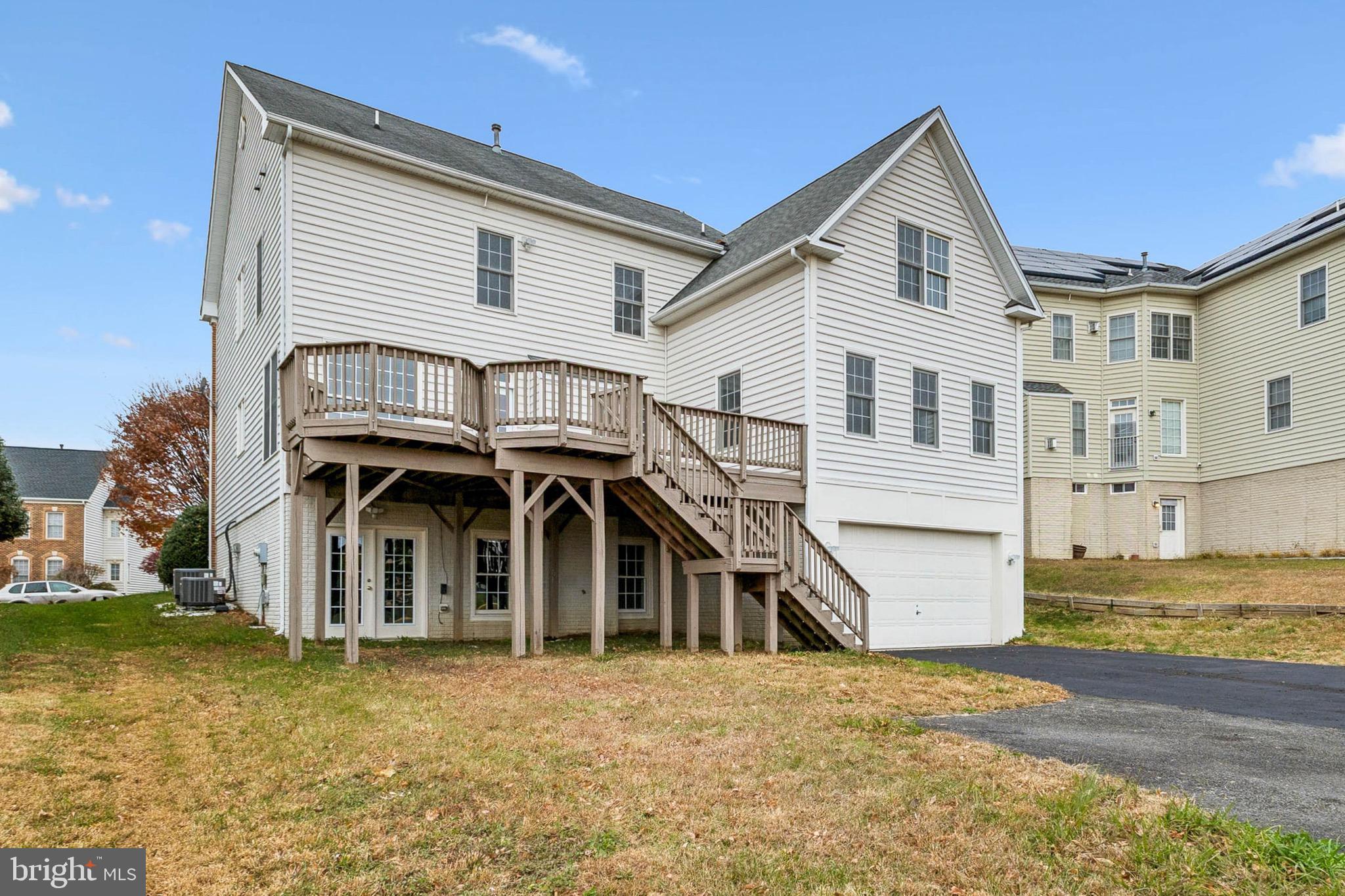 16363 Rusty Rudder Drive Woodbridge, VA 22191 - Photo 38 of 40 a front view of a house with a yard