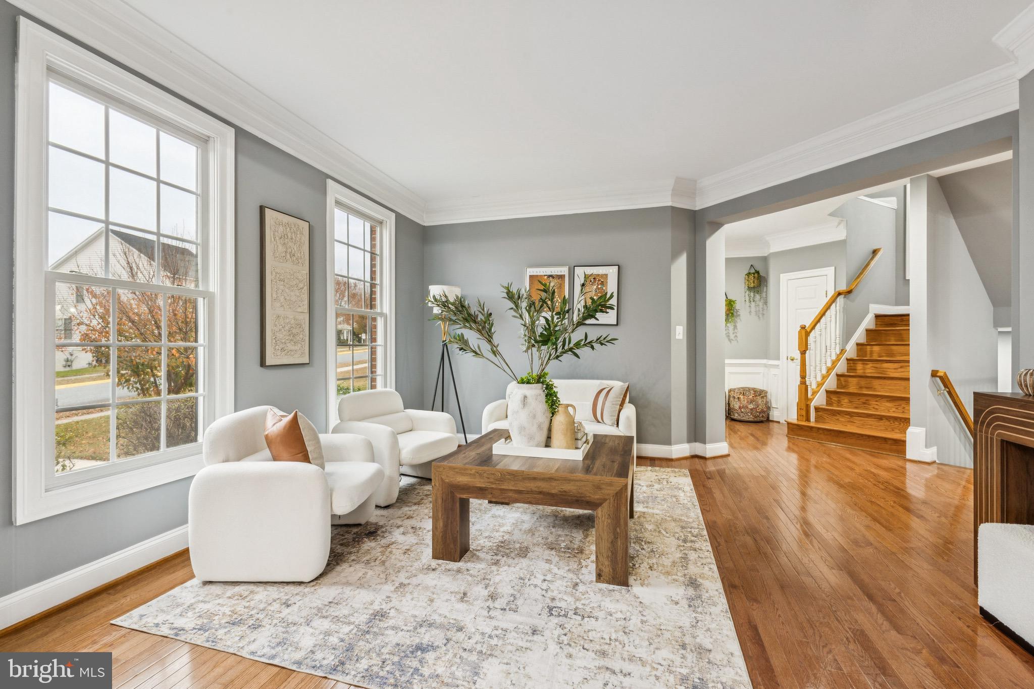 16363 Rusty Rudder Drive Woodbridge, VA 22191 - Photo 4 of 40 a living room with furniture and wooden floor