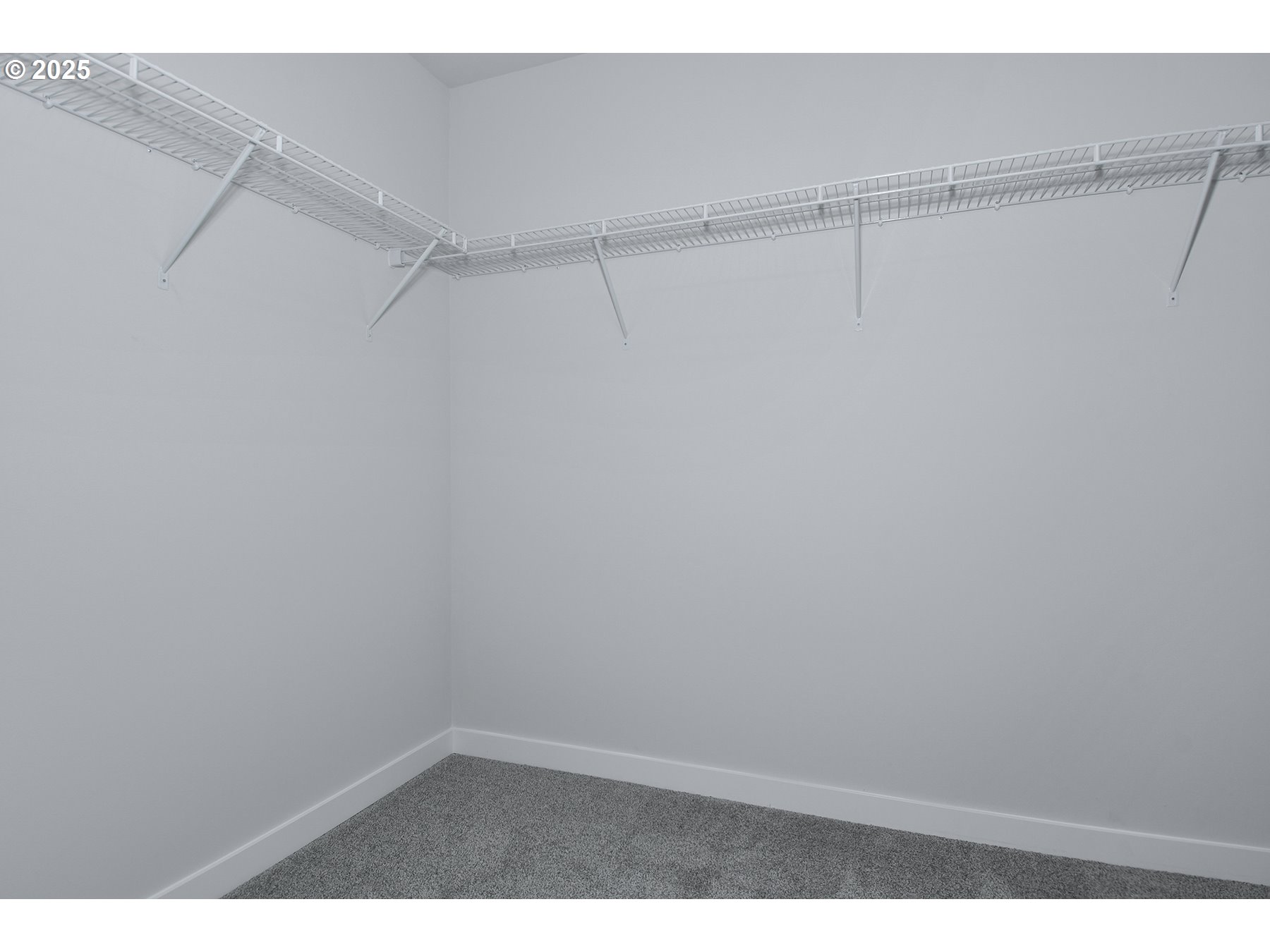 1375 Owl Avenue Woodburn, OR 97071 - Photo 15 of 20 a view of a room with racks on the wall