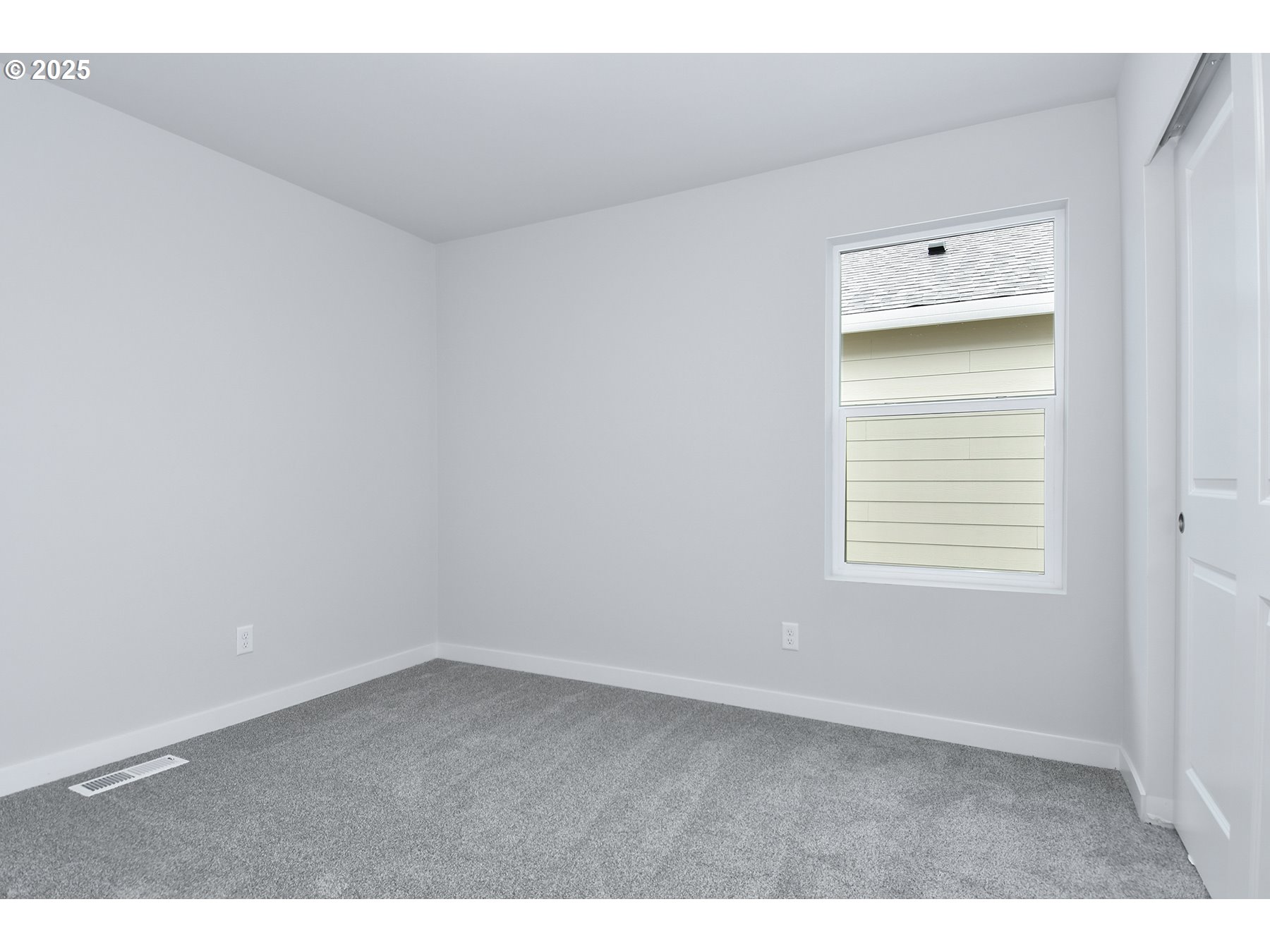 1375 Owl Avenue Woodburn, OR 97071 - Photo 18 of 20 a view of an empty room with a window