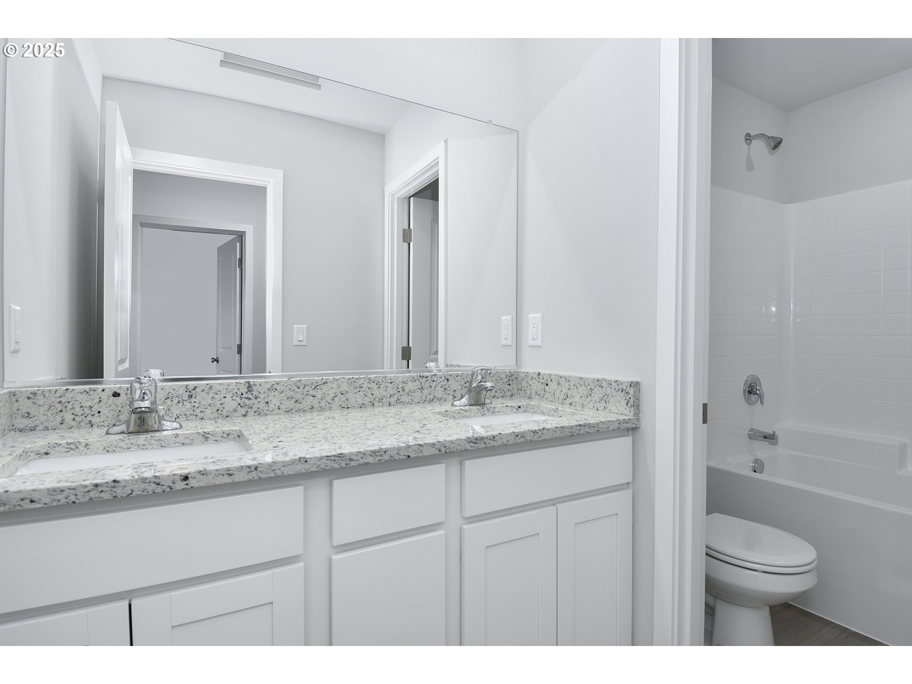 1375 Owl Avenue Woodburn, OR 97071 - Photo 20 of 20 a bathroom with a granite countertop sink and a mirror