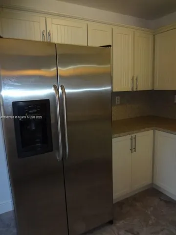 a close view of a refrigerator in kitchen