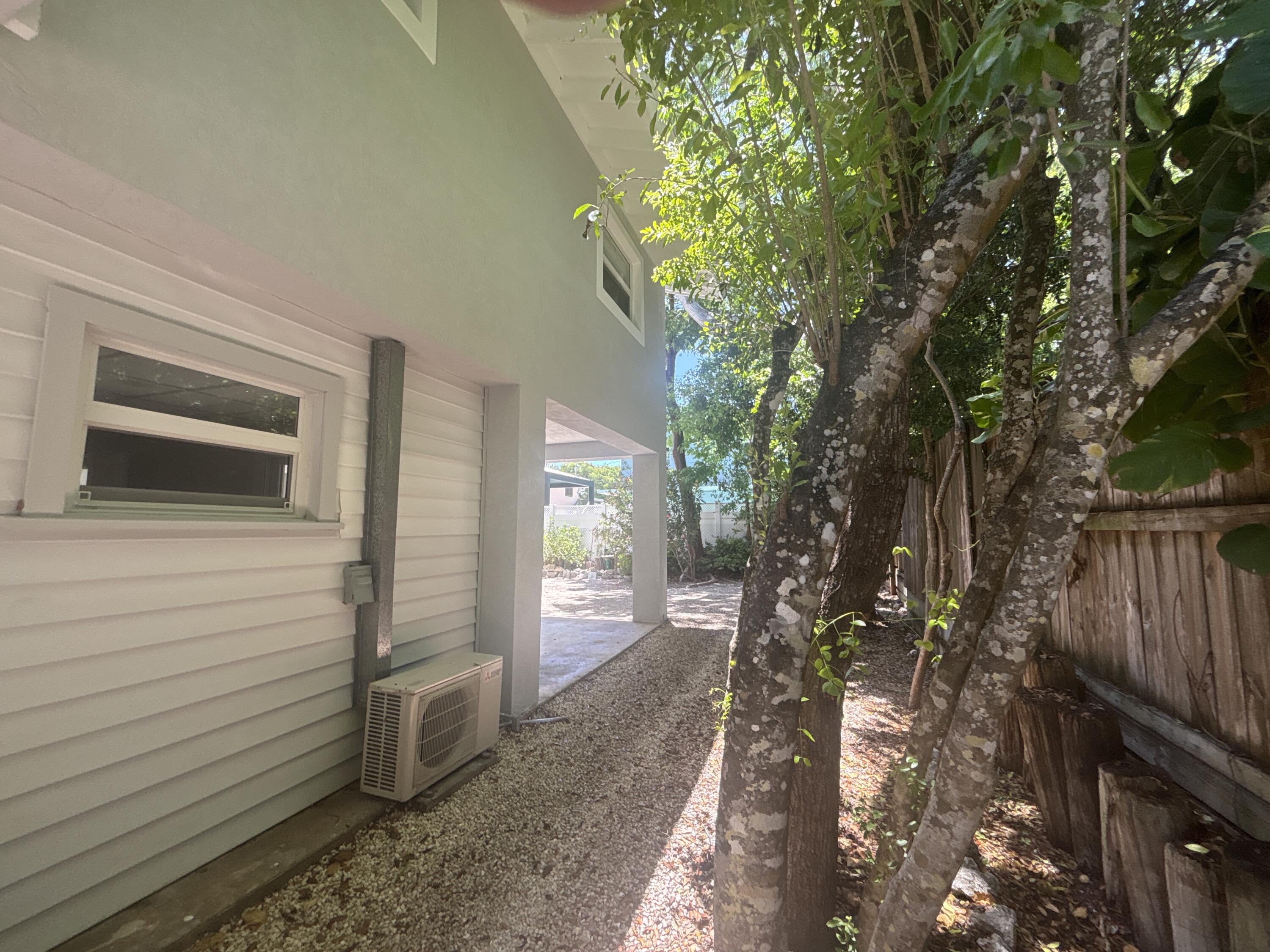 1033 Valencia Road Key Largo, FL 33037 - Photo 71 of 72 Hurricane Windows through
