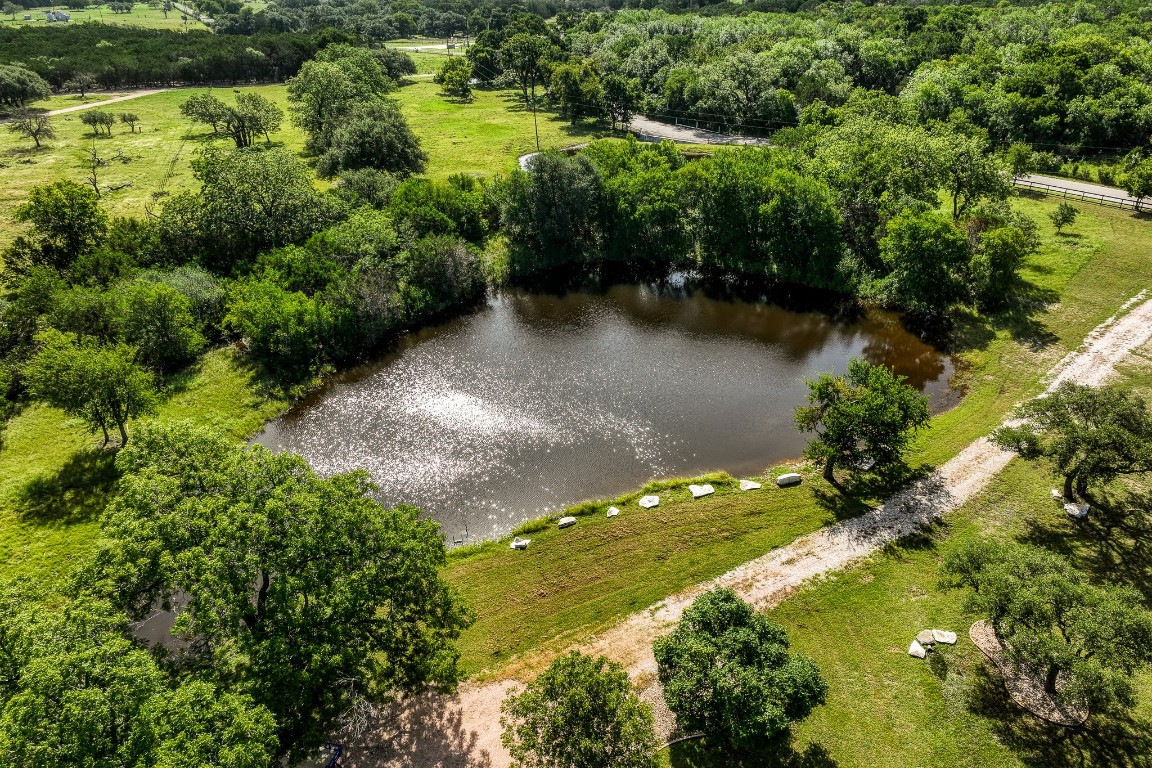 a view of a lake with a yard