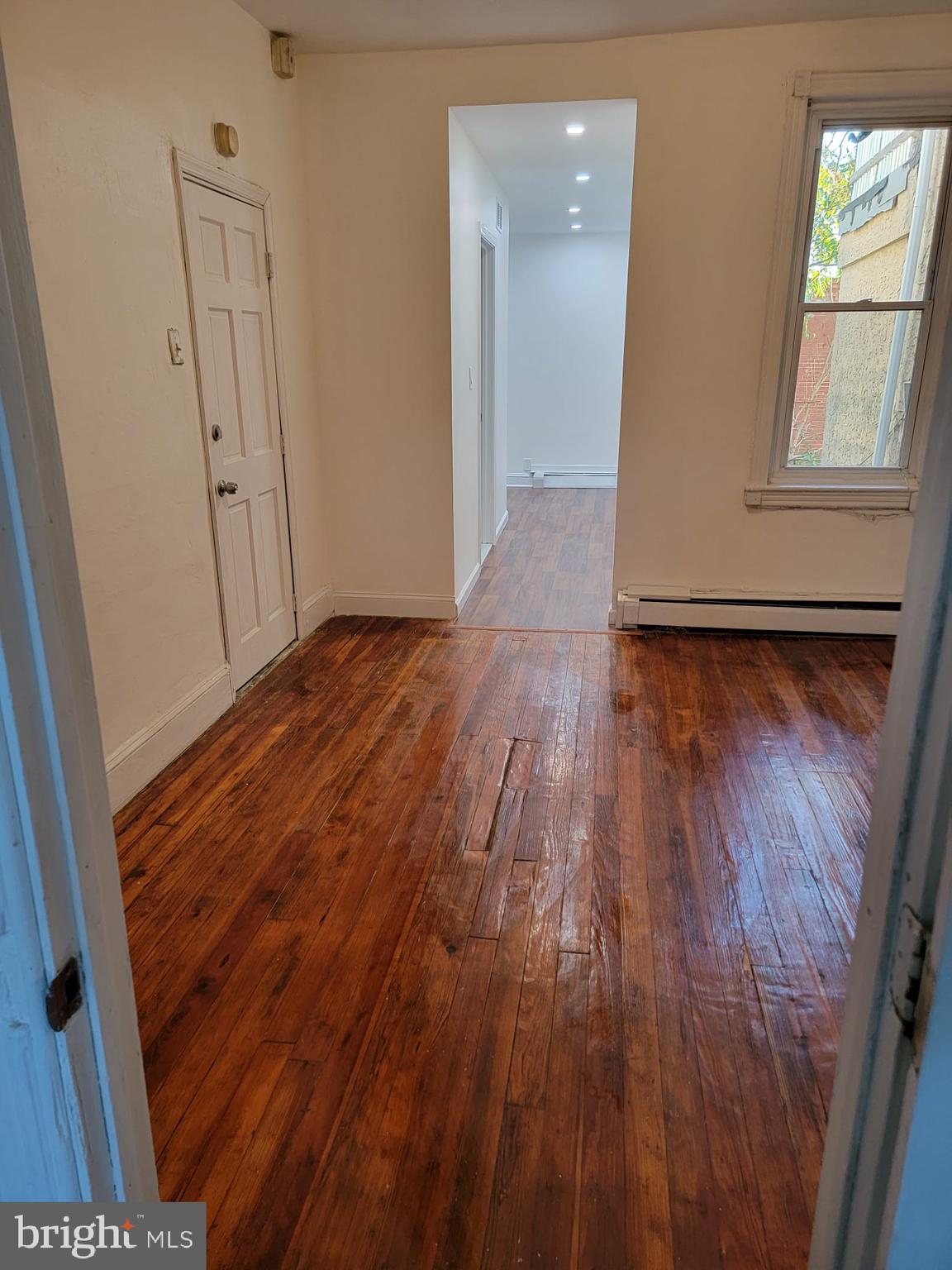 616 Tasker Street, Unit 2 Philadelphia, PA 19148 - Photo 19 of 22 wooden floor in an empty room