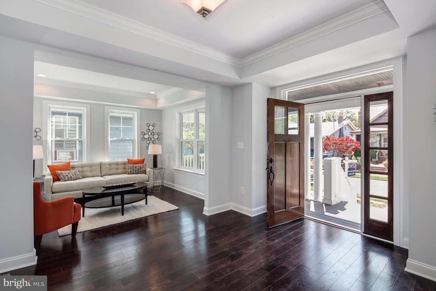 859 Venable Place Northwest Washington, DC 20012 - Photo 3 of 30 a living room with furniture and wooden floor