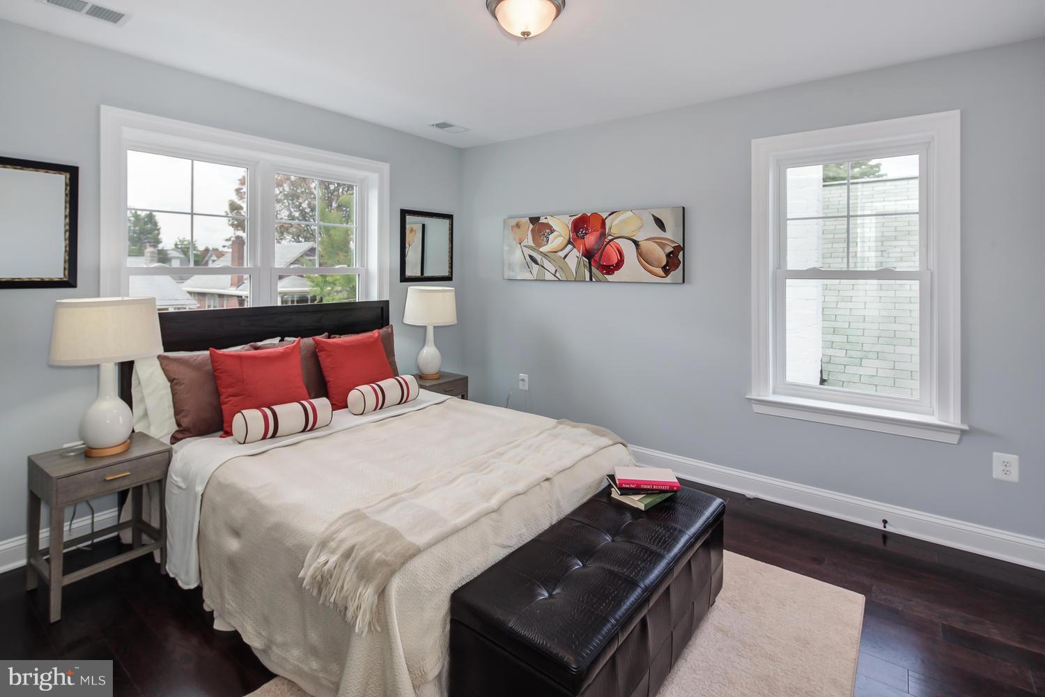 859 Venable Place Northwest Washington, DC 20012 - Photo 23 of 30 a bedroom with a bed and a window
