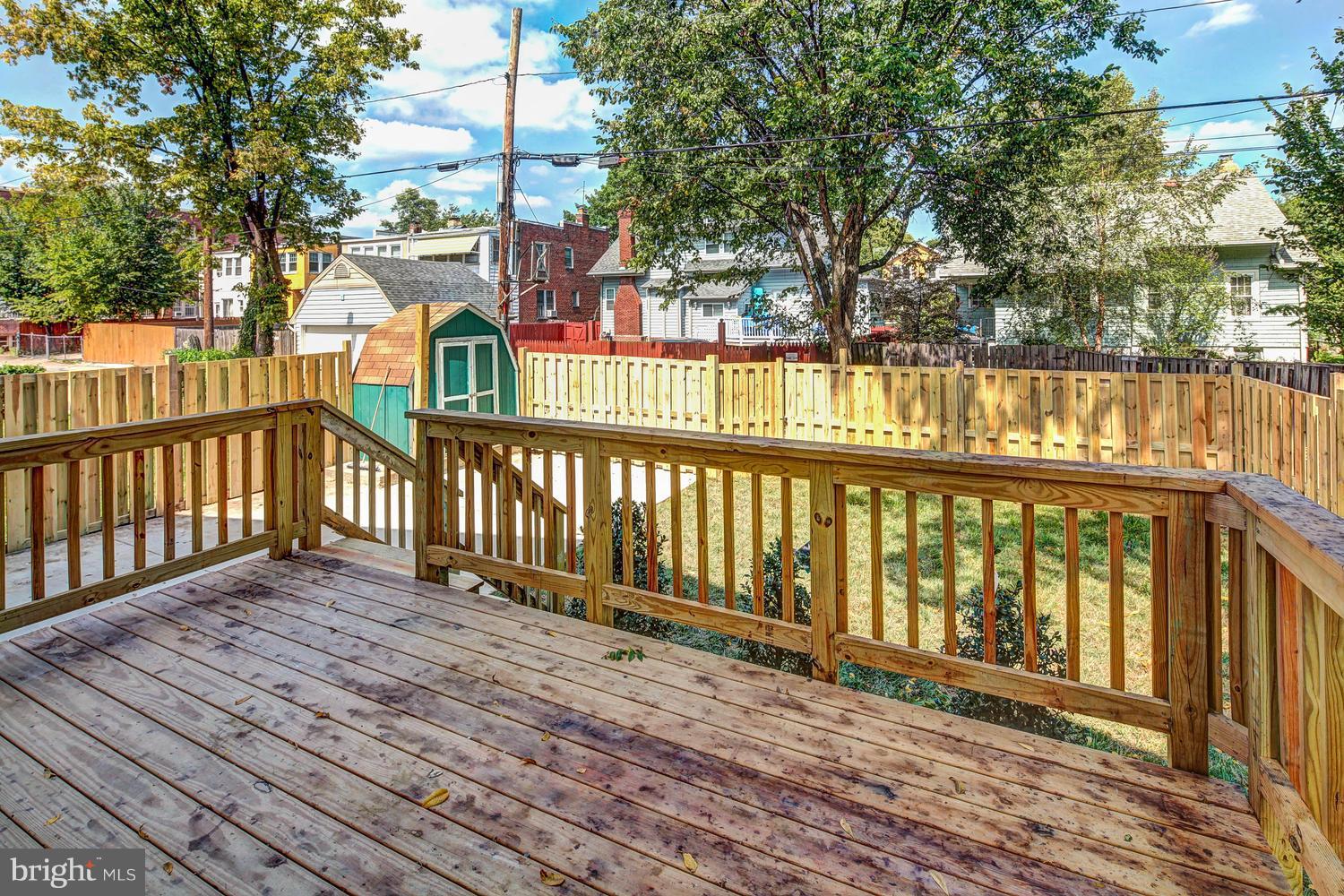 859 Venable Place Northwest Washington, DC 20012 - Photo 27 of 30 a view of wooden balcony with a swing