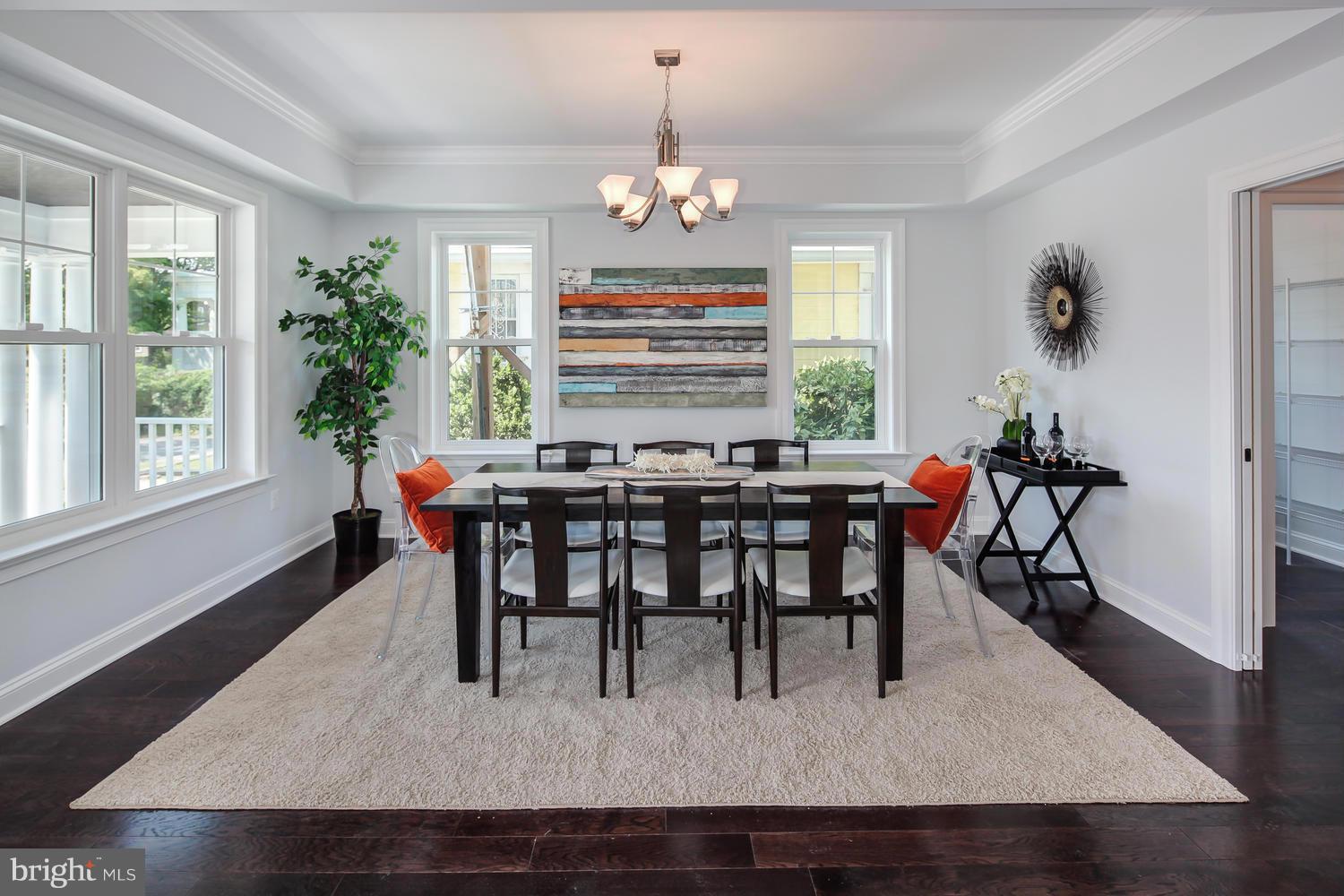 859 Venable Place Northwest Washington, DC 20012 - Photo 7 of 30 a view of a dining room with furniture window and wooden floor