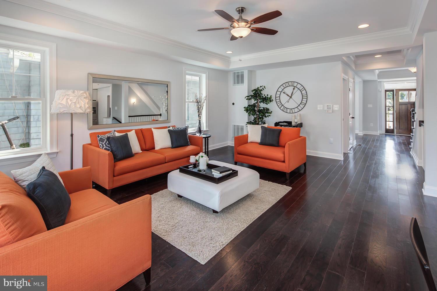859 Venable Place Northwest Washington, DC 20012 - Photo 9 of 30 a living room with furniture and wooden floor