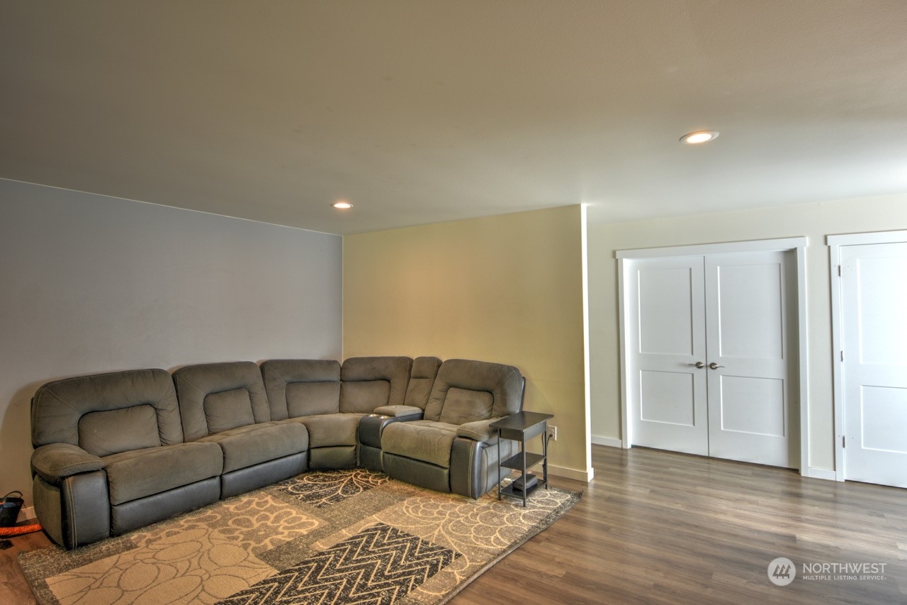 424 Brown Road East Chehalis, WA 98532 - Photo 15 of 25 a living room with furniture and a rug