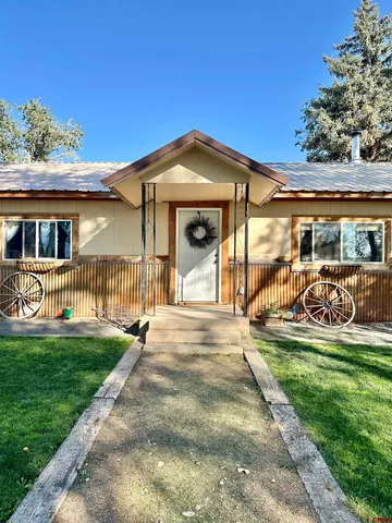 a view of a car park in front of house