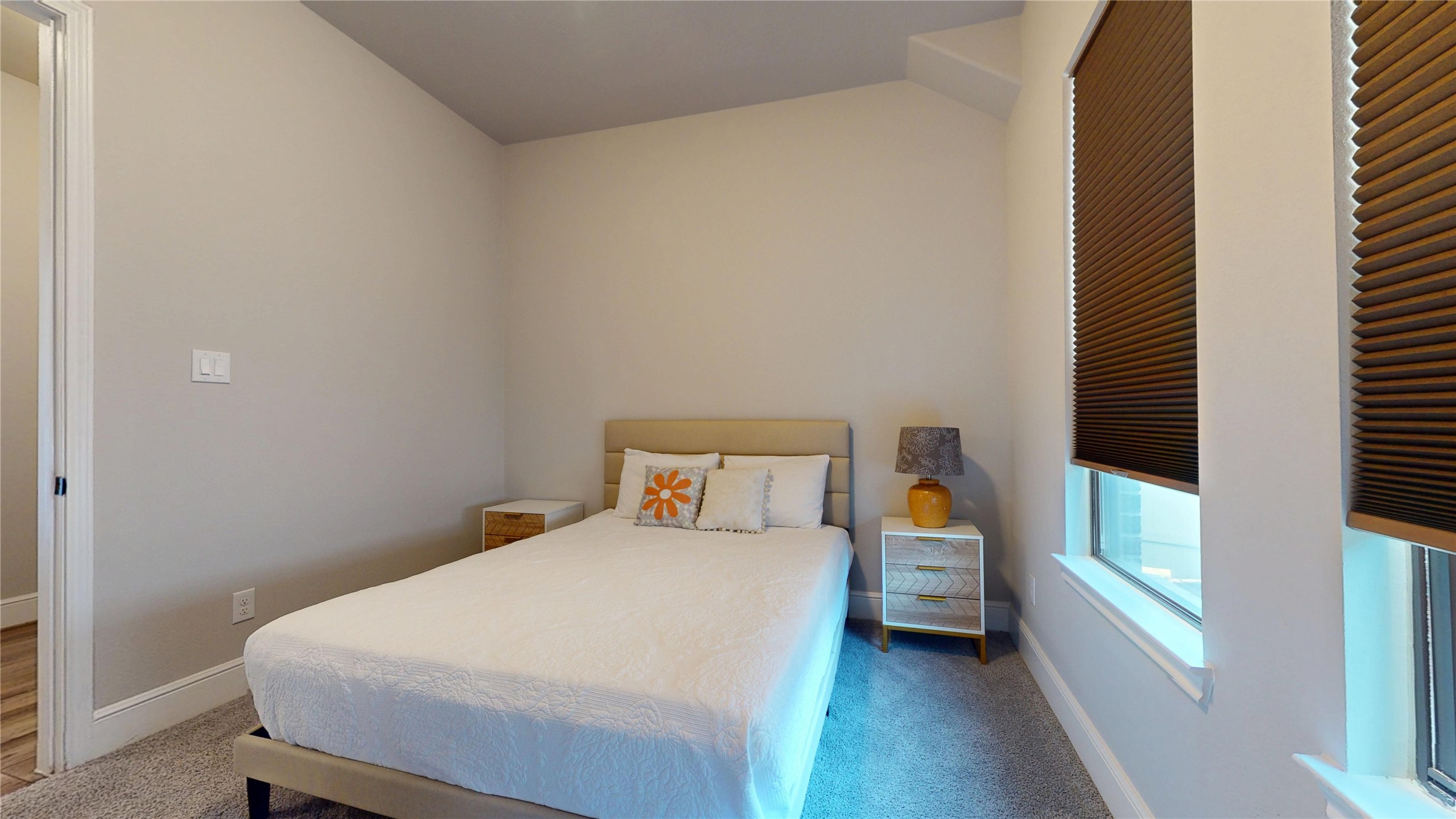 8305 Greenleaf Ridge Way Conroe, TX 77385 - Photo 18 of 33 a bedroom with a bed and a window