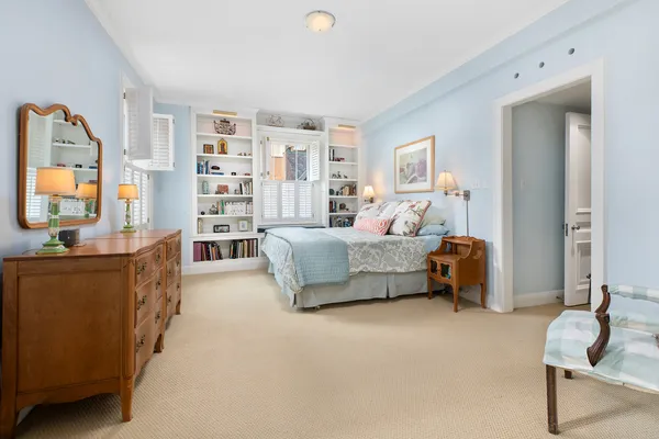 a bedroom with furniture and a couch