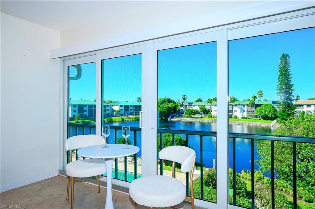 3055 Riviera Drive, Unit 306 Naples, FL 34103 - Photo 16 of 26 Open your sliders for a breeze!