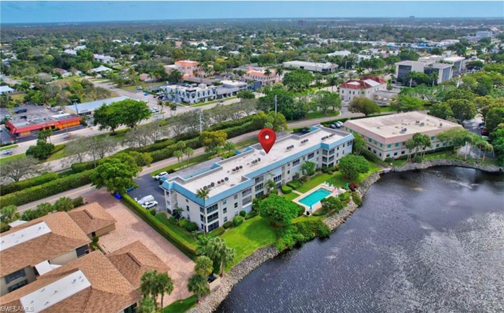 3055 Riviera Drive, Unit 306 Naples, FL 34103 - Photo 20 of 22 Aerial overview of property's location with apartment complex