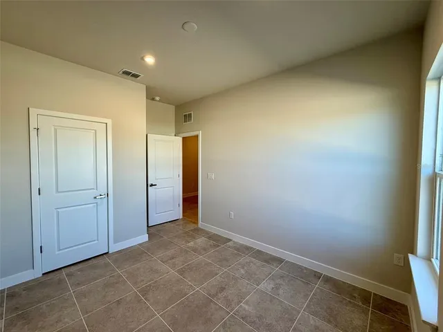 an empty room with a natural light