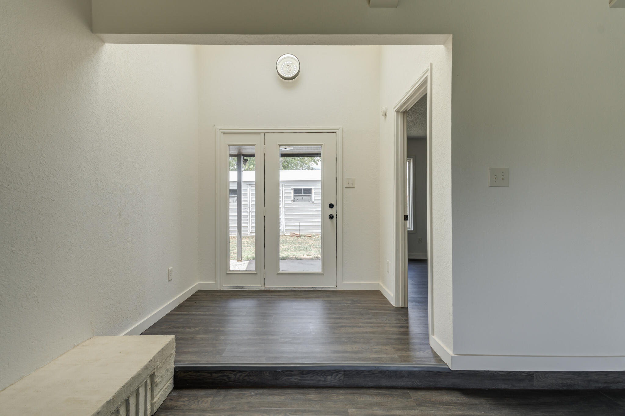3006 93rd Street Lubbock, TX 79423 - Photo 29 of 35 view of room with window and wooden floor