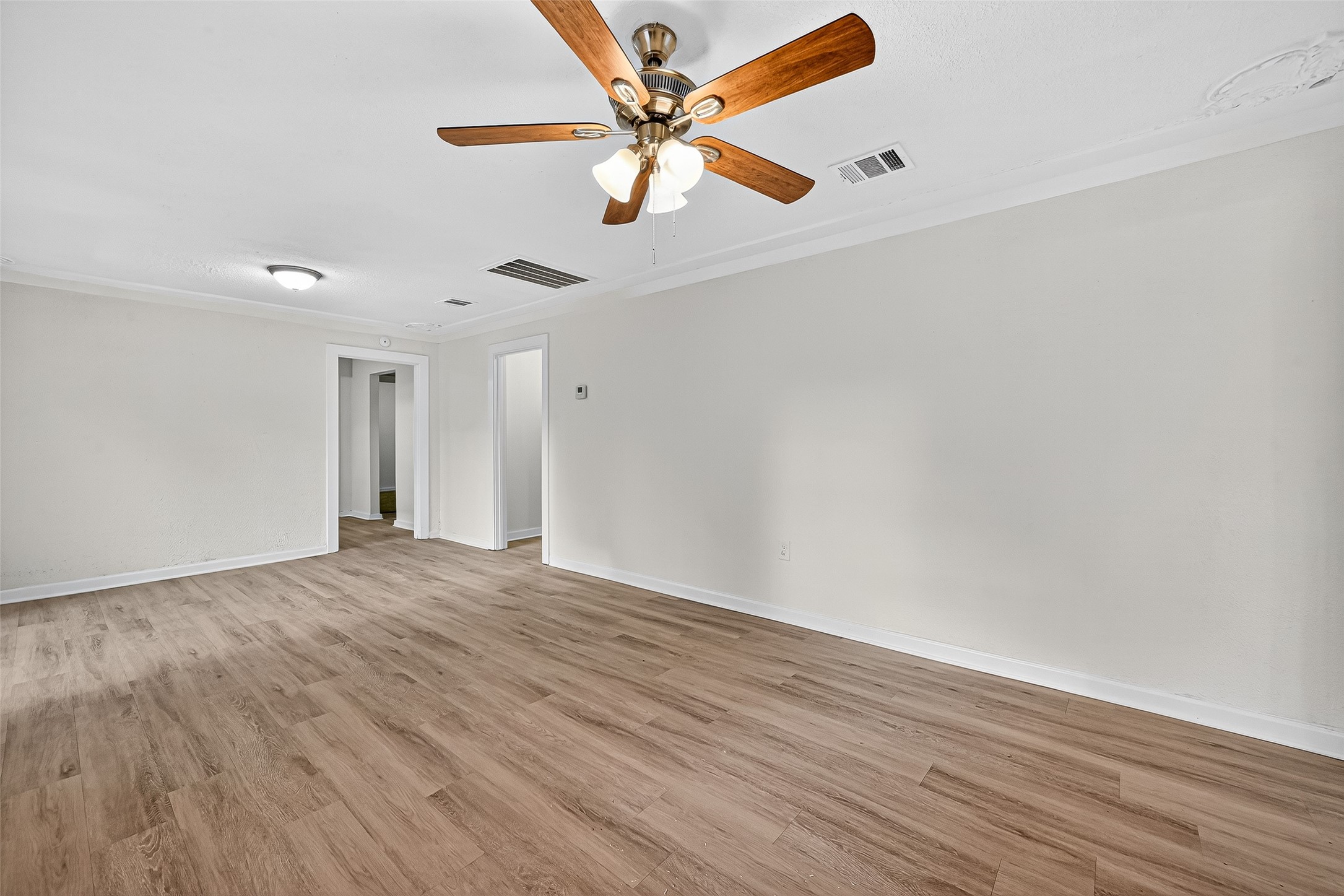 16643 Lake Circle Conroe, TX 77302 - Photo 17 of 47 wooden floor in an empty room