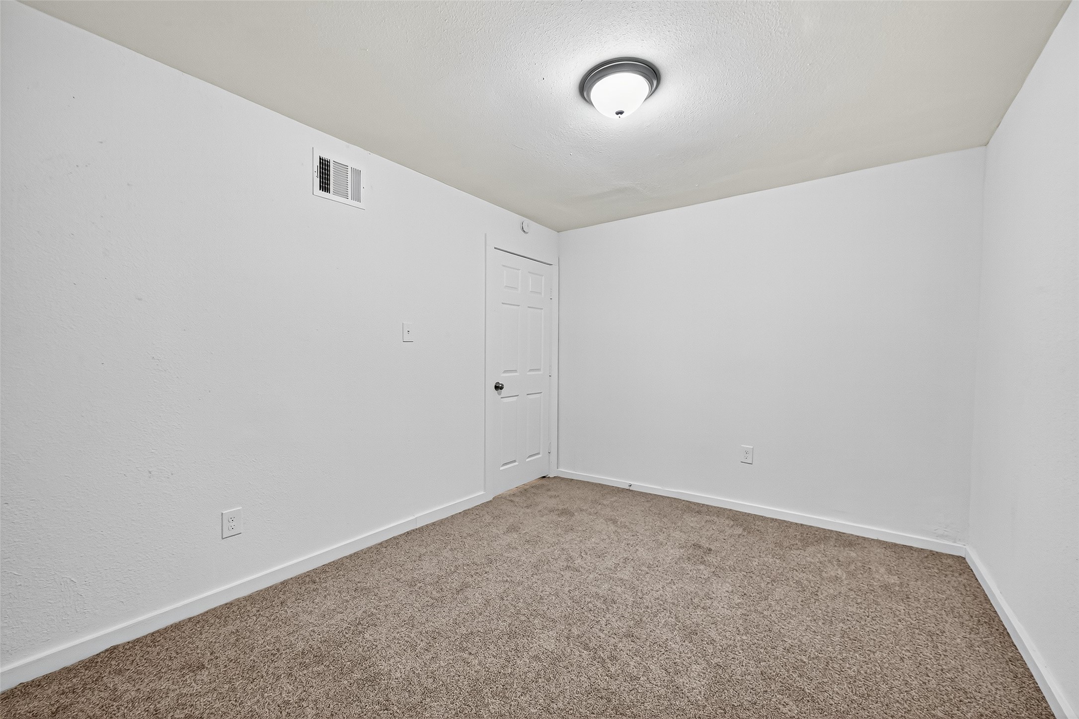 16643 Lake Circle Conroe, TX 77302 - Photo 26 of 47 an empty room with a empty space and a window