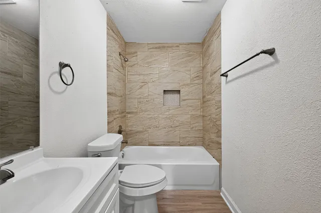 a bathroom with a sink and a toilet