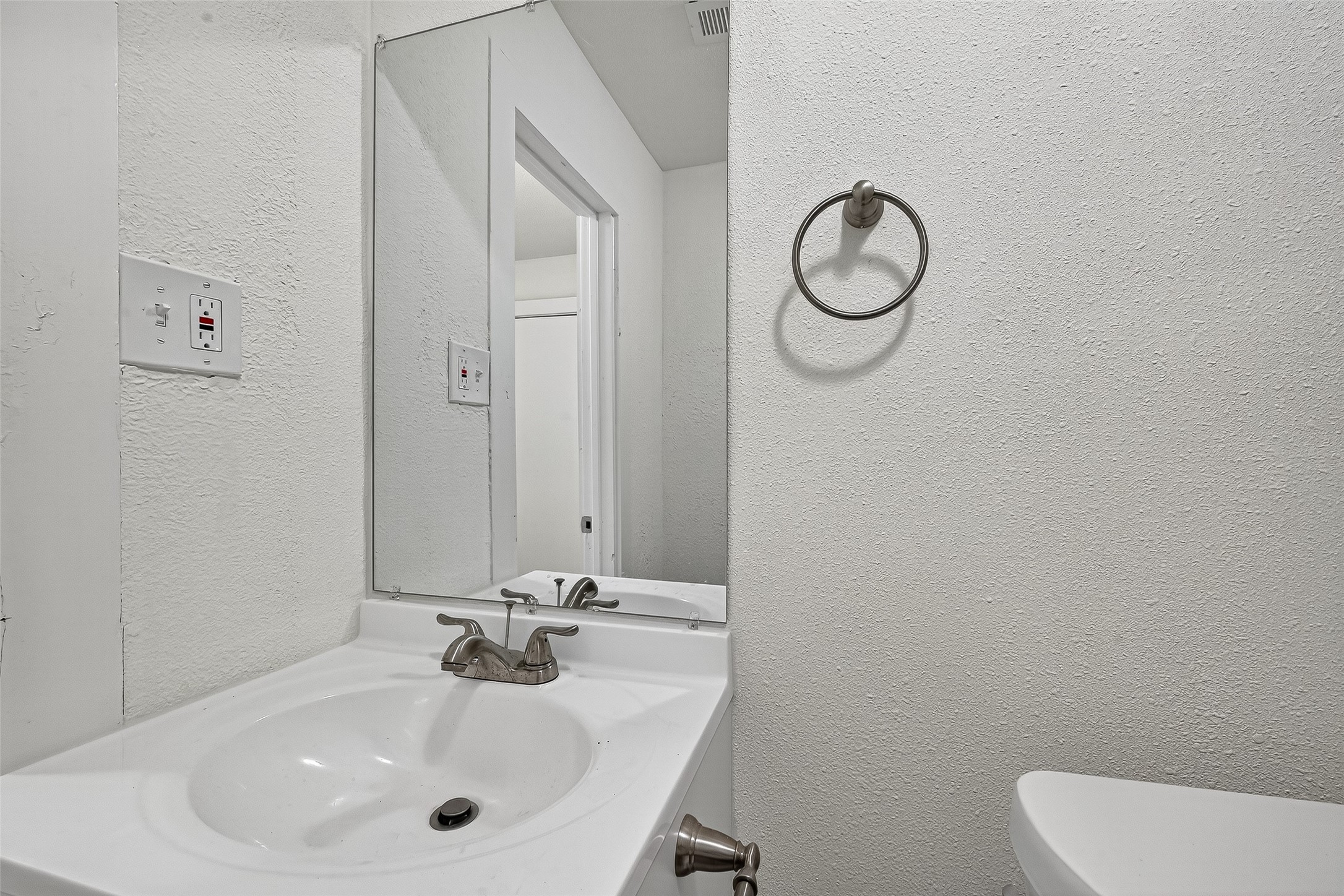 16643 Lake Circle Conroe, TX 77302 - Photo 30 of 47 a bathroom with a sink and a toilet