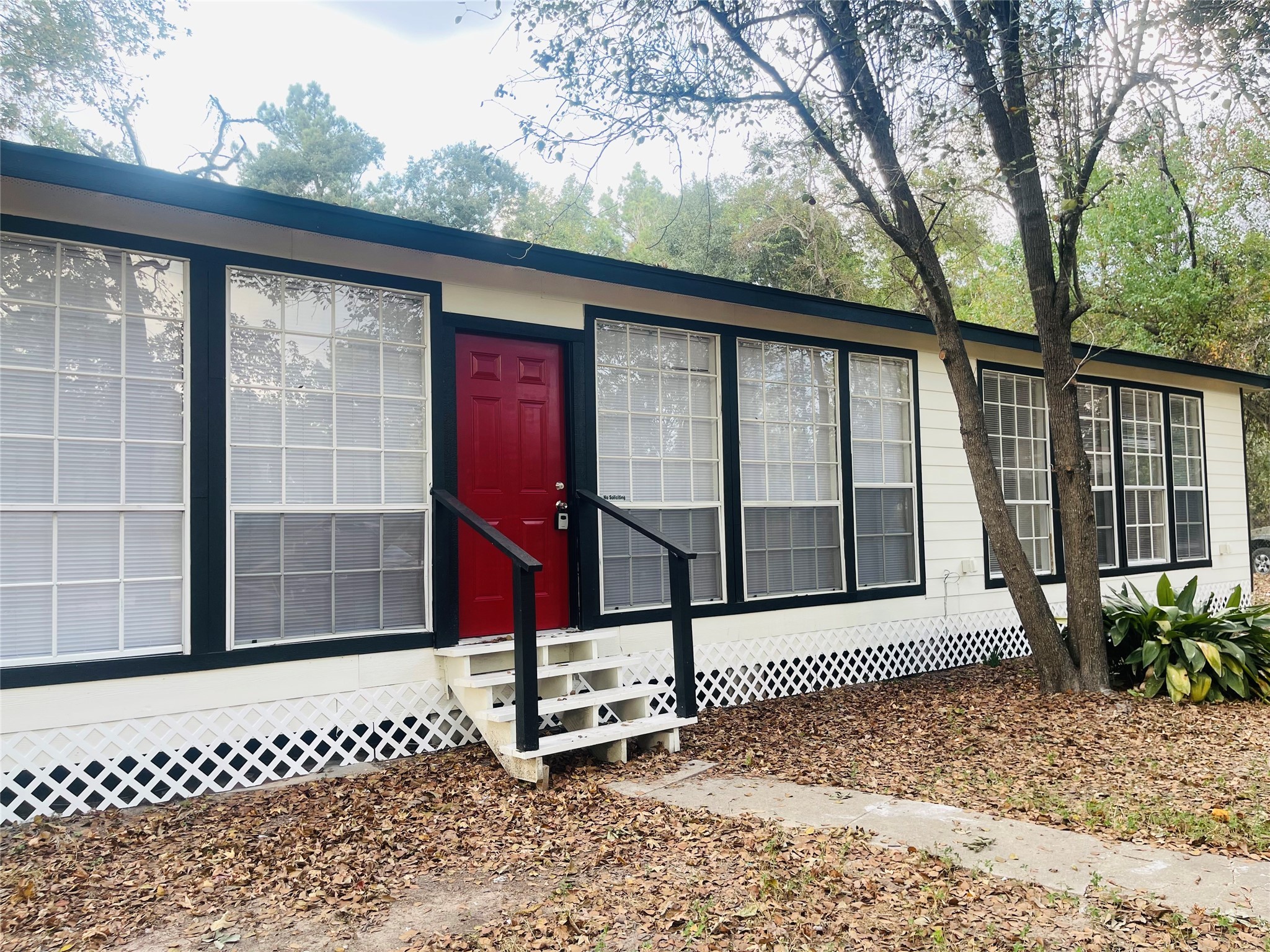 16643 Lake Circle Conroe, TX 77302 - Photo 3 of 47 a front view of a house