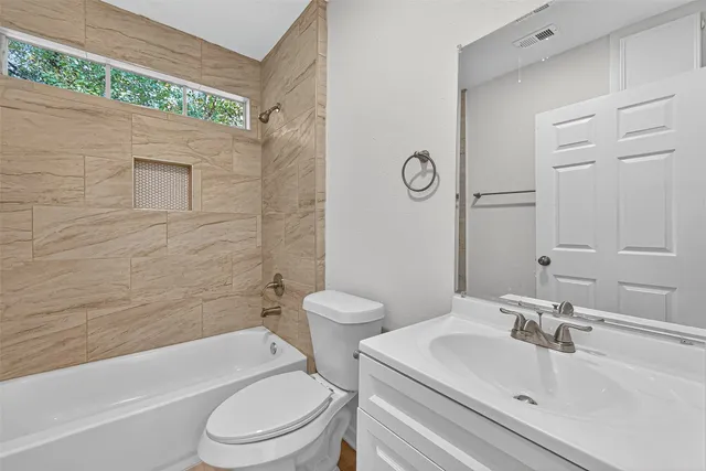 a bathroom with a bathtub