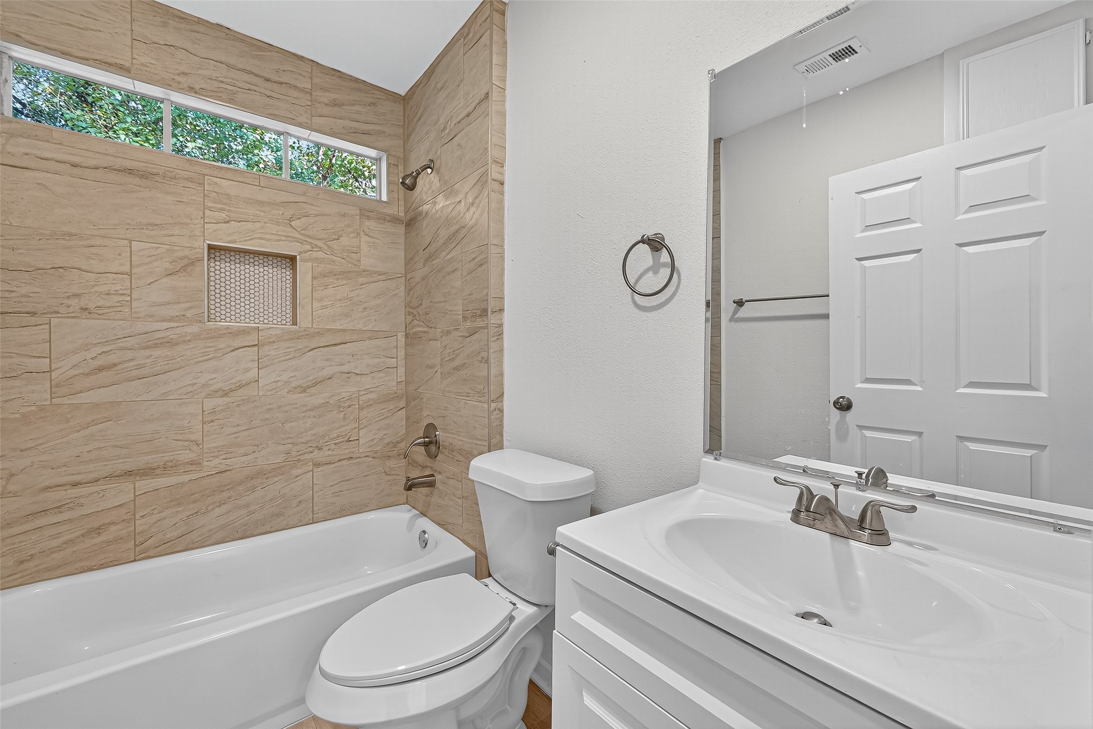 16643 Lake Circle Conroe, TX 77302 - Photo 38 of 47 a bathroom with a sink toilet and shower