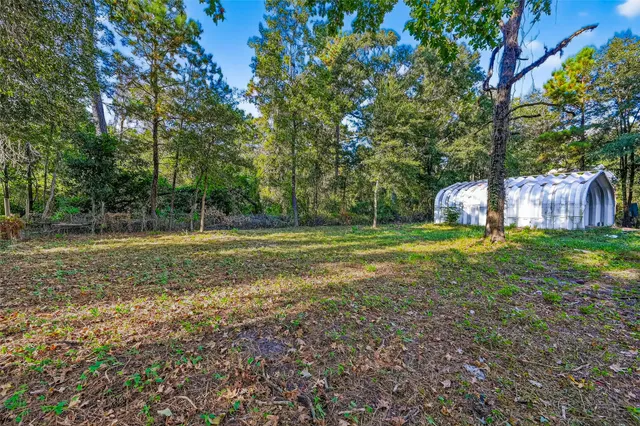 a house view with a garden space