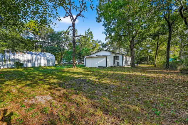 a house view with a garden space
