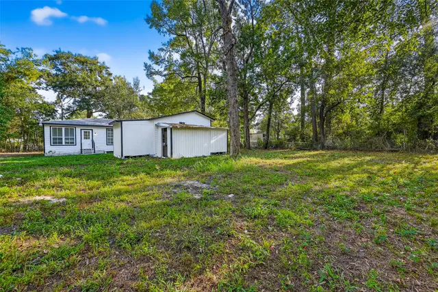 a view of outdoor space and yard