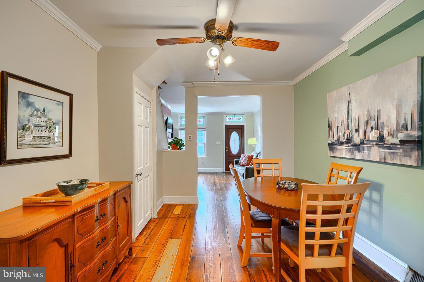 1806 Bank Street Baltimore, MD 21231 - Photo 5 of 21 a dining room with furniture and wooden floor