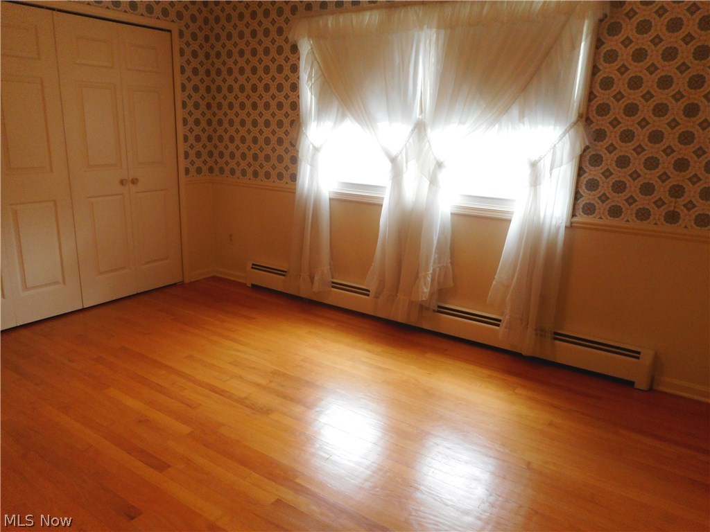 8800 Sherman Road Chesterland, OH 44026 - Photo 10 of 20 Another upstairs bedroom with plenty of closet space and walk in access to the attic.