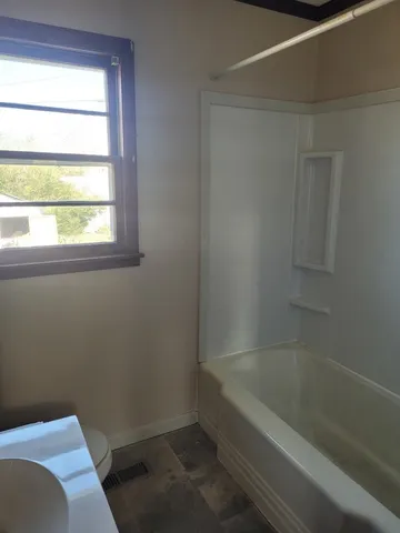 a bathroom with a bathtub