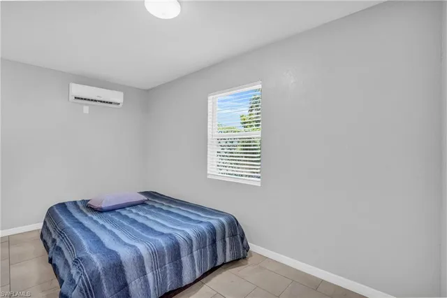 a view of kitchen with furniture and wooden floor