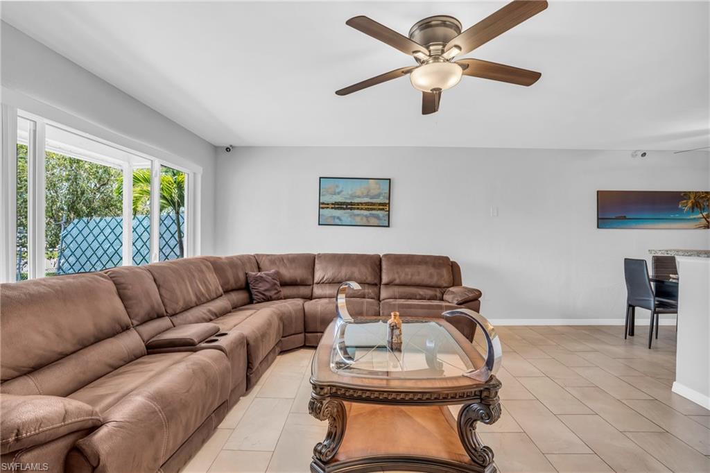 883 Coconut Circle East Naples, FL 34104 - Photo 2 of 32 a living room with furniture