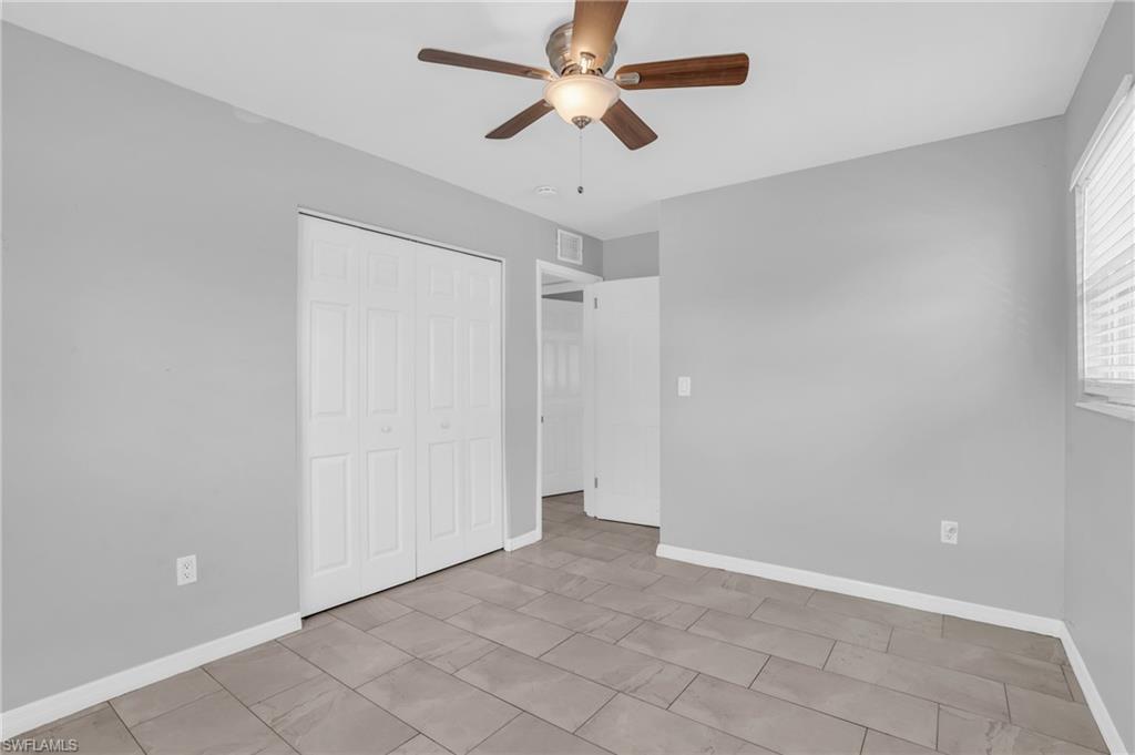 883 Coconut Circle East Naples, FL 34104 - Photo 21 of 32 a view of an empty room