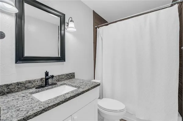 a view of hallway with washer and dryer