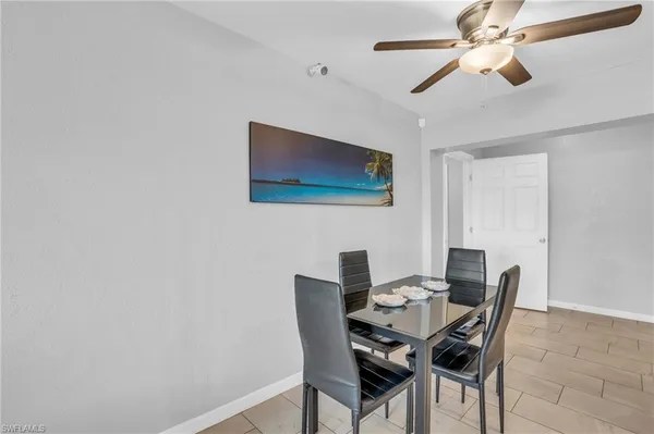 a view of a dining room with furniture