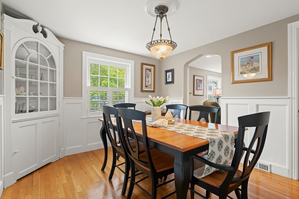 4 Joyce Road Arlington, MA 02474 - Photo 17 of 42 a view of a dining room with furniture window and wooden floor