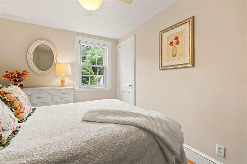 4 Joyce Road Arlington, MA 02474 - Photo 28 of 42 a bedroom with a bed and a window