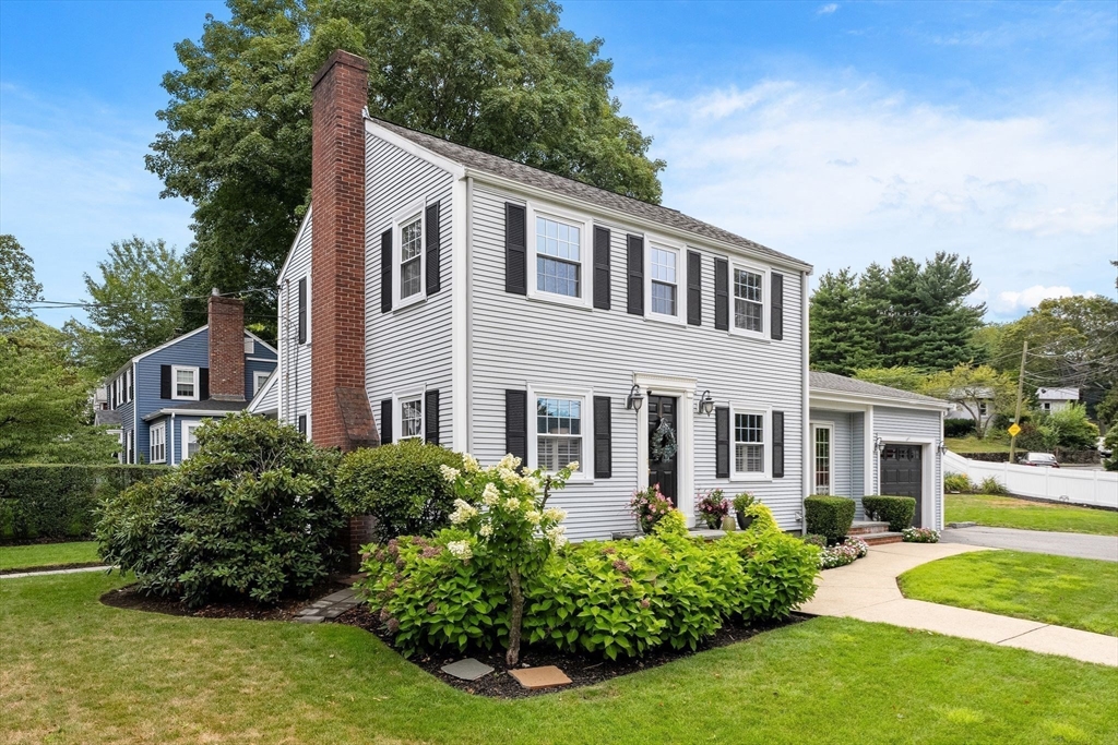 4 Joyce Road Arlington, MA 02474 - Photo 42 of 42 a front view of a house with a yard