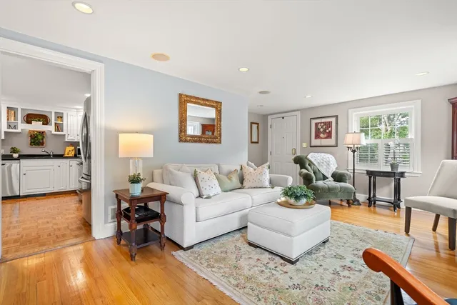 a living room with furniture and a table