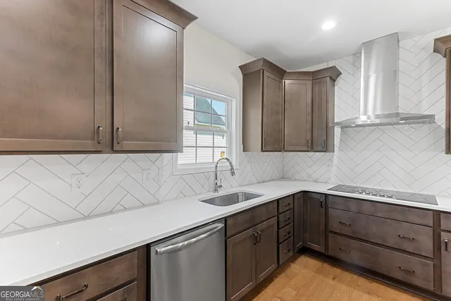 an empty room with a ceiling fan and window