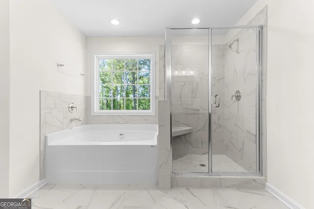 a view of swimming pool with seating space