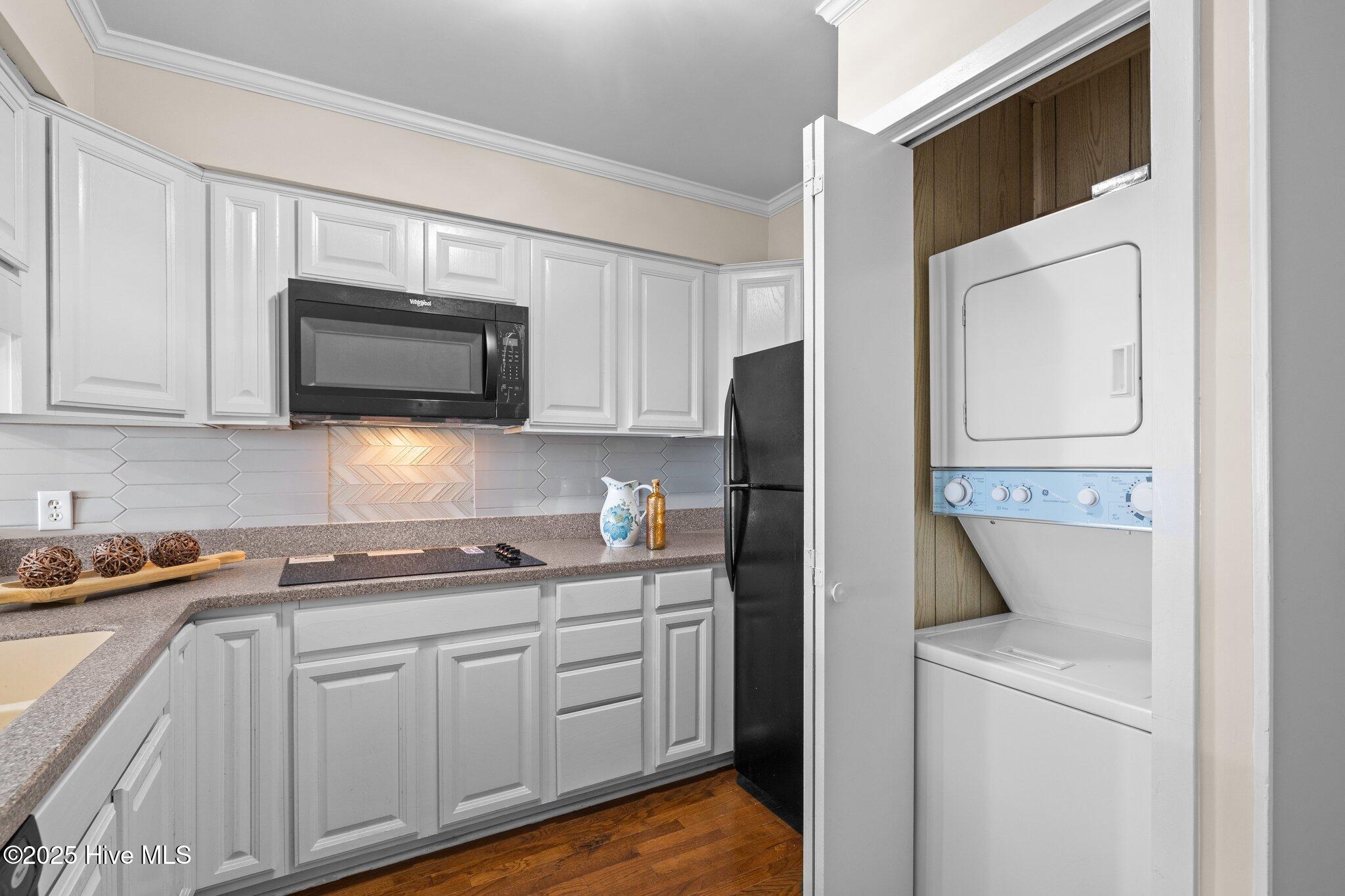 1904 East Fort Macon Road, Unit 180 Atlantic Beach, NC 28512 - Photo 15 of 38 Laundry Closet In Kitchen